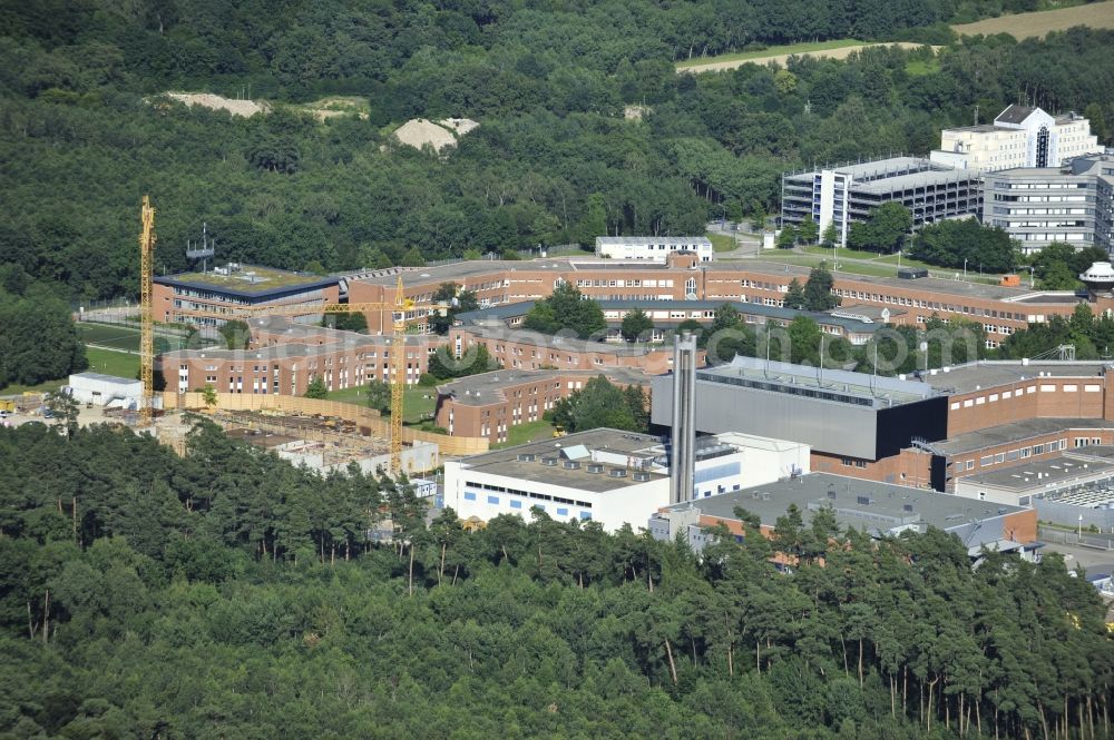 Langen from above - View of the campus of the German Air Traffic Control as well as the Paul Ehrlich Institute in Langen in Hesse. The German Air Traffic Control (DFS) is the civil aviation administration of federal, led by the Federal Ministry of Transport, Building and Urban Development (BMVBS). DFS is currently building a technology center, which was designed by the architectural firm Brown Volleth and is scheduled for late 2014. The Paul-Ehrlich-Institut is the Federal Institute for Vaccines and biomedical drug