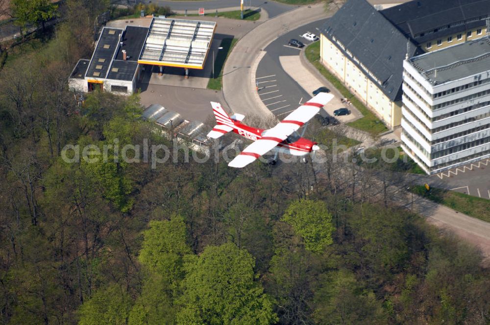 Aerial photograph Suhl - Blick auf eine Cessna im Flug über Suhl. Dies ist eine Cessna FR 172 J Rocket. Die Cessna 172 ist der bekannteste Flugzeugtyp unter Privatfliegern und auch unter dem Namen Skyhawk bekannt.