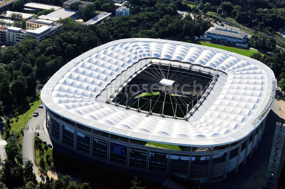 Frankfurt am Main from above - View of the Commerzbank Arena in Frankfurt am Main. The arena, which is often called Walstadion, is located south of the river Main. The stadium, which opened in 1925 and has since then been repeatedly modernized, was on the occasion of the FIFA World Cup 2006 designed by the architectural firm Gerkan, Marg and Partners and built between 2002 and 2005 as a pure soccer stadium. With a capacity of 51,500 spectators, it is one of the ten largest soccer stadiums in Germany. The opening of the new stadium took place in June 2005