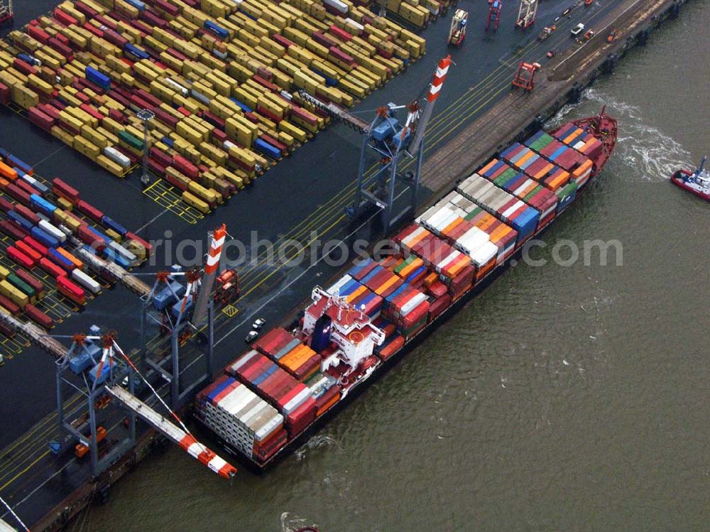 Aerial photograph Bremerhaven - 20.10.2005 Bremerhaven; Dank seiner geographisch günstigen Lage an der Wesermündung hat sich Bremerhaven als Teil des Bundeslandes Bremen zu einem der bedeutendsten europäischen Containerhäfen und Europas größtem Autoumschlagsplatz entwickelt. Die Logistik an den verschiedenen Hafen-Terminals wird hier von der BLG Logistics Group, die der inzwischen 125 jährigen Bremer Lagerhaus Gesellschaft mit Sitz in Bremen ange-hört, und deren Gemeinschaftsunternehmen Eurogate geleistet.