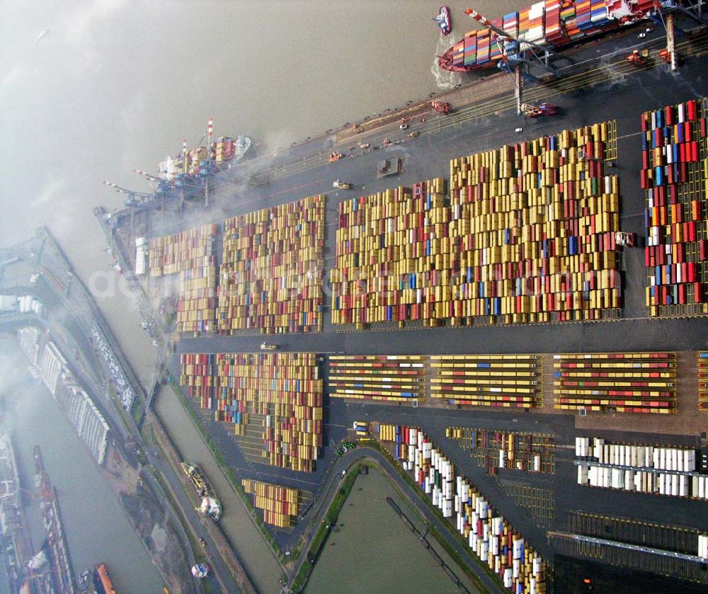 Bremerhaven from the bird's eye view: 20.10.2005 Bremerhaven; Dank seiner geographisch günstigen Lage an der Wesermündung hat sich Bremerhaven als Teil des Bundeslandes Bremen zu einem der bedeutendsten europäischen Containerhäfen und Europas größtem Autoumschlagsplatz entwickelt. Die Logistik an den verschiedenen Hafen-Terminals wird hier von der BLG Logistics Group, die der inzwischen 125 jährigen Bremer Lagerhaus Gesellschaft mit Sitz in Bremen ange-hört, und deren Gemeinschaftsunternehmen Eurogate geleistet.