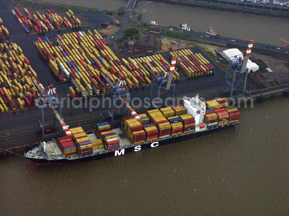 Aerial image Bremerhaven - 20.10.2005 Bremerhaven; Dank seiner geographisch günstigen Lage an der Wesermündung hat sich Bremerhaven als Teil des Bundeslandes Bremen zu einem der bedeutendsten europäischen Containerhäfen und Europas größtem Autoumschlagsplatz entwickelt. Die Logistik an den verschiedenen Hafen-Terminals wird hier von der BLG Logistics Group, die der inzwischen 125 jährigen Bremer Lagerhaus Gesellschaft mit Sitz in Bremen ange-hört, und deren Gemeinschaftsunternehmen Eurogate geleistet.