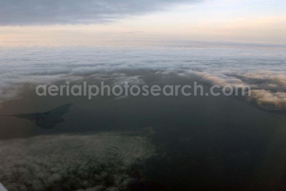 Aerial image Amsterdam - Blick auf Cumuluswolkenschicht über Amsterdam vor dem Landeanflug in einem Airbus A310