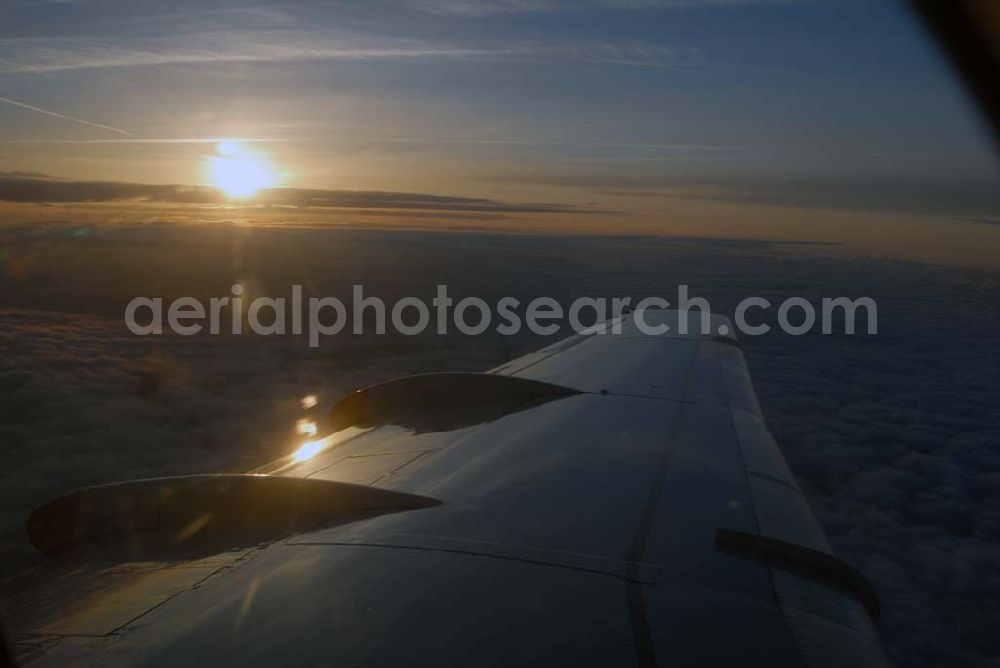 Aerial photograph Amsterdam - Blick auf Cumuluswolkenschicht über Amsterdam vor dem Landeanflug in einem Airbus A310