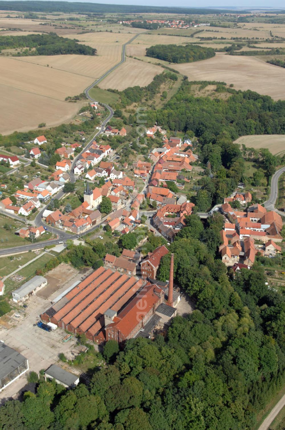 Aerial image Deuna - Blick auf Deuna mit Umland. Deuna ist eine Gemeinde im Landkreis Eichsfeld. Sie befindet sich im Bundesland Thüringen und gehört zur Verwaltungsgesellschaft Eichsfelder Kessel. 1162 wurde Deuna das erste Mal urkundlich erwähnt. Kontakt: Gemeinde Deuna, Hauptstraße 30, 37355 Deuna, Tel.: +49(0)36076 44761, Achim Walder: