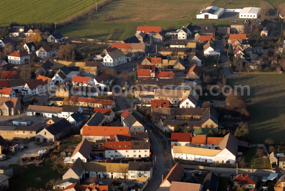 Aerial photograph Mockrehna - Blick auf das Dorf Schöna der Gemeinde Mockrehna. Schöna liegt im Freistaat Sachsen zwischen Eilenburg und Torgau. 1201 wurde das Dorf erstmalig erwähnt. Damals hieß der Ort “Sconowe”. (Gemeindeverwaltung Schöna, Salzstr. 19, 04862 Mockrehna, Tel.: 034244/51225)