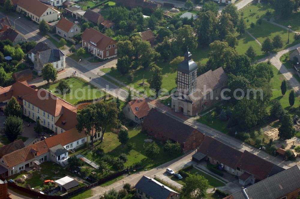 Aerial image Wust - Blick auf die Dorfkirche in Wust, die Teil der Ferienstraße Straße der Romanik. Die Straße der Romanik verbindet die Dome, Burgen, Klöster und Kirchen die in der Zeit vom 10. bis Mitte des 13. Jahrhundert entstanden, und somit ein Zeichen der Christianisierung sind.