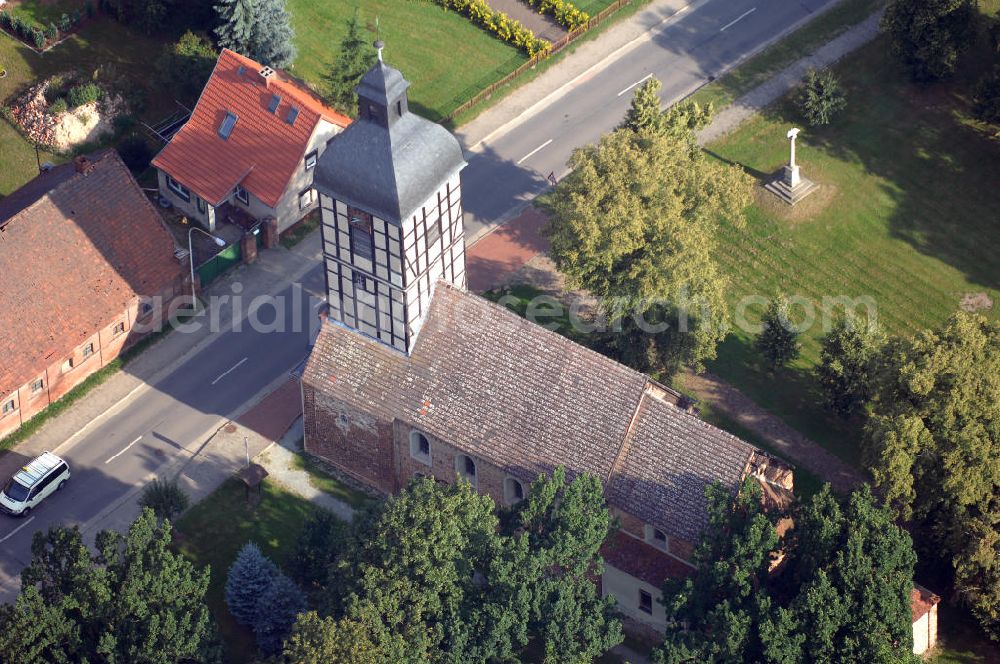 Wust from the bird's eye view: Blick auf die Dorfkirche in Wust, die Teil der Ferienstraße Straße der Romanik. Die Straße der Romanik verbindet die Dome, Burgen, Klöster und Kirchen die in der Zeit vom 10. bis Mitte des 13. Jahrhundert entstanden, und somit ein Zeichen der Christianisierung sind.