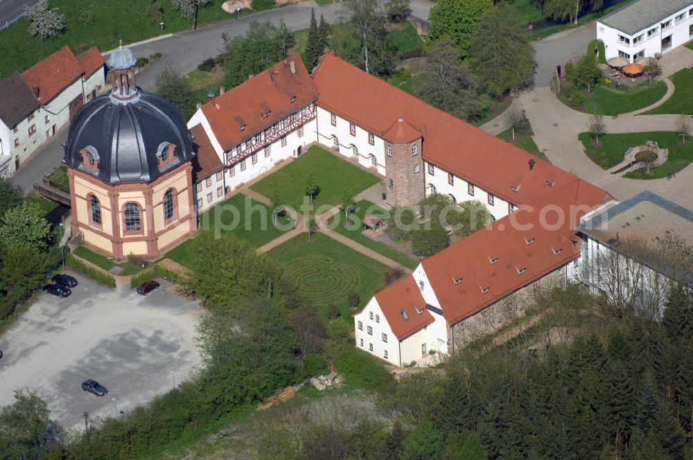 Holzkirchen from the bird's eye view: Blick auf das ehemalige Benedektinerkloster in Holzkirchen (Unterfranken). Die Gründung des Benediktushofes geht auf das 8. Jahrhundert zurück. Nach seiner Blütezeit im 12. Jahrhundert verfielen die Gebäude immer mehr. Nach einem nur 200 Jahre andauerndeHolzkirchen 04.05.2008 Blick auf das ehemalige Benedektinerkloster in Holzkirchen (Unterfranken). Die Gründung des Benediktushofes geht auf das 8. Jahrhundert zurück. Nach seiner Blütezeit im 12. Jahrhundert verfielen die Gebäude immer mehr. Nach einem nur 200 Jahre andauernden Aufschwung und den wiederkehrenden Verfall wurde das Anwesen 2002 durch eine Unternehmerin gekauft. Er wurde 2004 als Zentrum für spirituelle Wege feierlich eingeweiht. Seitdem finden dort Kurse und Veranstaltungen zu Themen wie Philosophie, Theologie und Spiritualität statt. Kontakt: Klosterstraße 10, 97292 Holzkirchen / Unterfranken, Tel. +49 (0)9369 9838 0, Fax +49 (0)9369 9838 38, Email info@benediktushof-holzkirchen.de