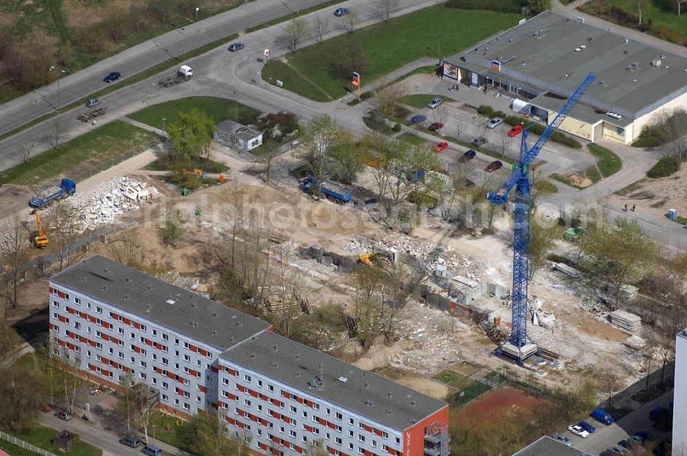 Aerial image Berlin - Blick auf eine Baustelle in Berlin-Hellersdorf-Nord (Biesdorf). Der Eigentümer Degewo hat drei Plattenbauten wegen Wohnungsleerstand abreißen lassen. Geplant sind für die Freiflächen ein Stadtplatz, neue Handelseinrichtungen sowie kleinere Wohnhäuser mit größerem Komfort. Kontakt: DEGEWO Potsdamer Str. 60, 10785 Berlin, Tel. (0)30 26485 0, Fax +49(0)30 26485 4320, Email: info@degewo.de