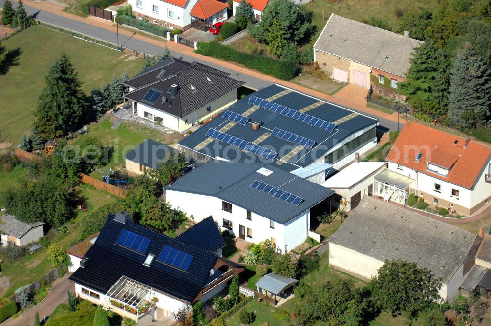 Aerial image Tauche - Blick auf Einfamilienhäuser zwischen der Poststraße und der Schwalbenstraße in Lindenberg. Dies ist ein Ortsteil der Gemeinde Tauche im Landkreis Oder-Spree in Brandenburg. Kontakt: