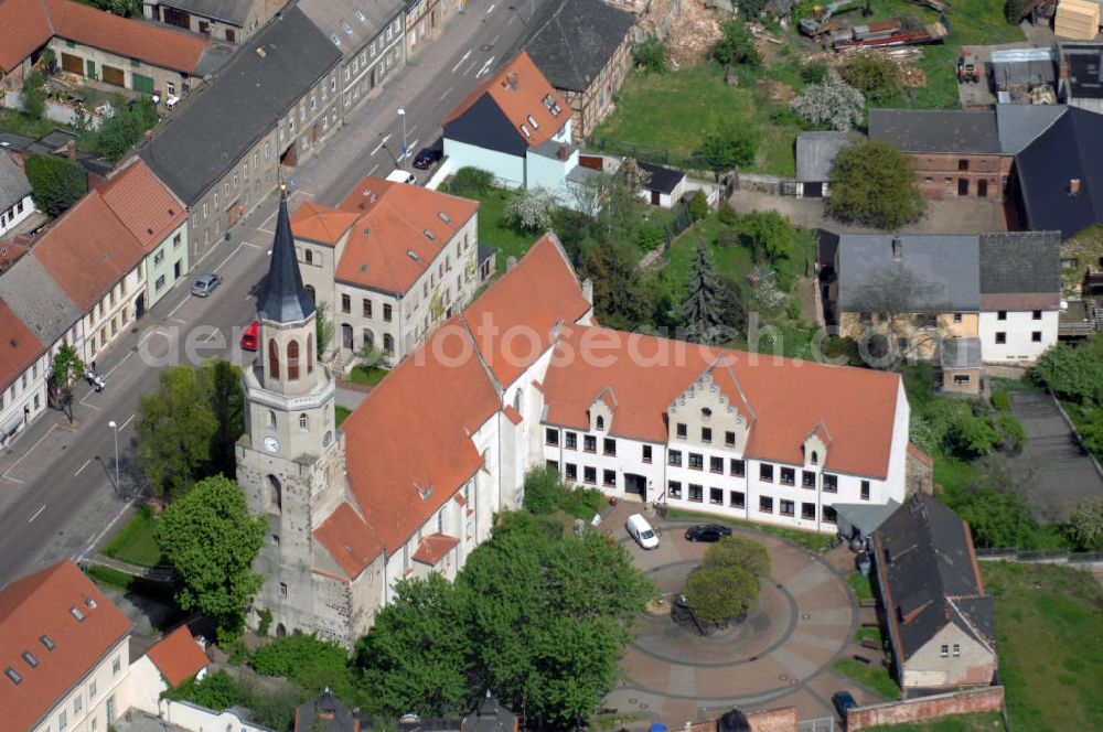 Coswig (Anhalt) from the bird's eye view: Blick auf die Evangelische Kirche in Coswig (Anhalt). Die St. Nicolai Kirche wurde 1150 im romanischen Stil erbaut und ist das älteste Gebäude der Stadt. Pfarramt: Schloßstr. 58, 06869 Coswig (Anhalt), Tel. +49 (0)34903 62938, Fax +49 (0)34903 62538, EMail st_nicolai@web.de