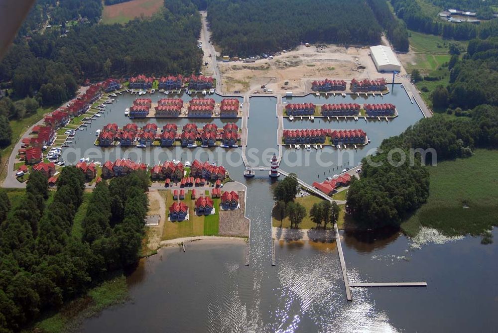 Aerial photograph Rheinsberg - Blick auf das fast fertige Hafendorf Rheinsberg - Projektgesellschaft Hafendorf Rheinsberg GmbH,Lenaustr. 27,D-12305 Berlin,Telefon: +49 33931/34 161,Telefax: +49 33931/34 163,Email: info@hafendorf-rheinsberg.de,Achim Walder: