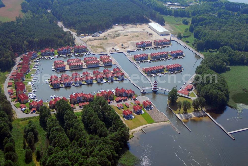 Aerial image Rheinsberg - Blick auf das fast fertige Hafendorf Rheinsberg - Projektgesellschaft Hafendorf Rheinsberg GmbH,Lenaustr. 27,D-12305 Berlin,Telefon: +49 33931/34 161,Telefax: +49 33931/34 163,Email: info@hafendorf-rheinsberg.de,Achim Walder: