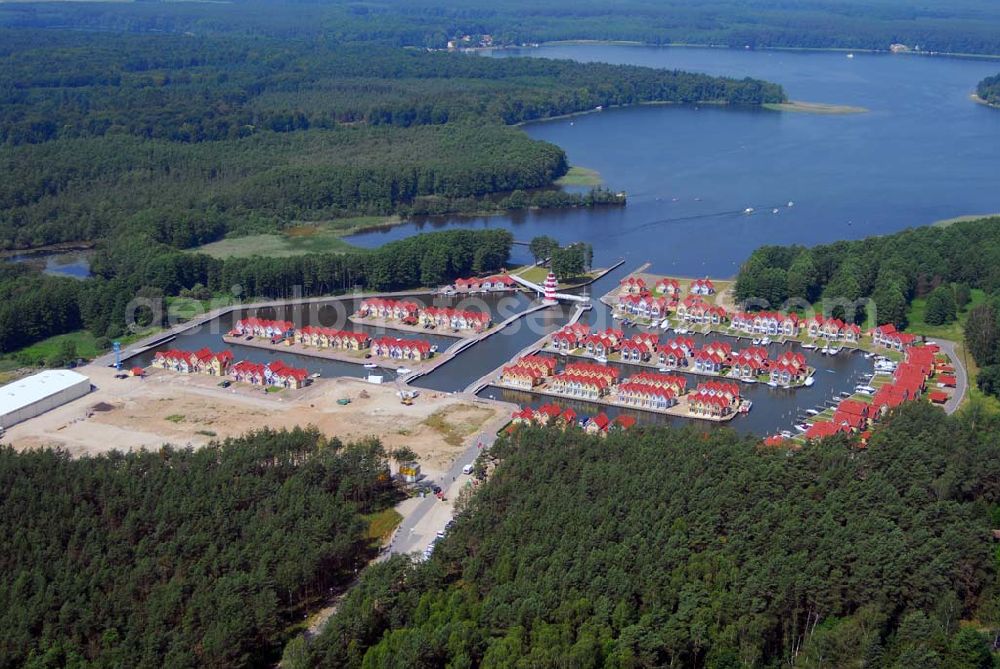 Aerial photograph Rheinsberg - Blick auf das fast fertige Hafendorf Rheinsberg - Projektgesellschaft Hafendorf Rheinsberg GmbH,Lenaustr. 27,D-12305 Berlin,Telefon: +49 33931/34 161,Telefax: +49 33931/34 163,Email: info@hafendorf-rheinsberg.de,Achim Walder: