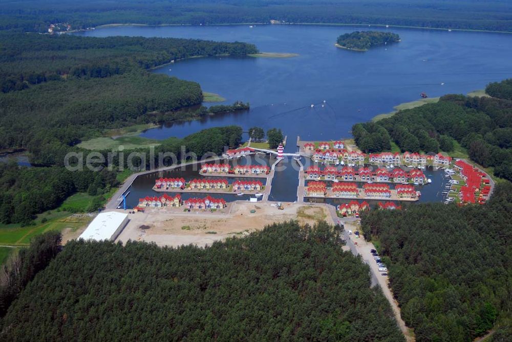 Rheinsberg from the bird's eye view: Blick auf das fast fertige Hafendorf Rheinsberg - Projektgesellschaft Hafendorf Rheinsberg GmbH,Lenaustr. 27,D-12305 Berlin,Telefon: +49 33931/34 161,Telefax: +49 33931/34 163,Email: info@hafendorf-rheinsberg.de,Achim Walder: