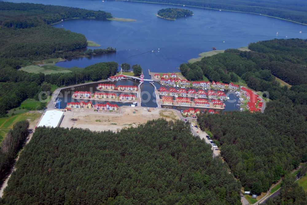 Aerial photograph Rheinsberg - Blick auf das fast fertige Hafendorf Rheinsberg - Projektgesellschaft Hafendorf Rheinsberg GmbH,Lenaustr. 27,D-12305 Berlin,Telefon: +49 33931/34 161,Telefax: +49 33931/34 163,Email: info@hafendorf-rheinsberg.de,Achim Walder: