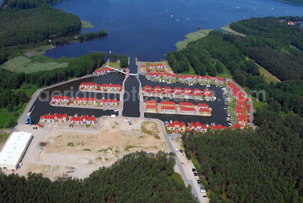 Aerial photograph Rheinsberg - Blick auf das fast fertige Hafendorf Rheinsberg - Projektgesellschaft Hafendorf Rheinsberg GmbH,Lenaustr. 27,D-12305 Berlin,Telefon: +49 33931/34 161,Telefax: +49 33931/34 163,Email: info@hafendorf-rheinsberg.de,Achim Walder: