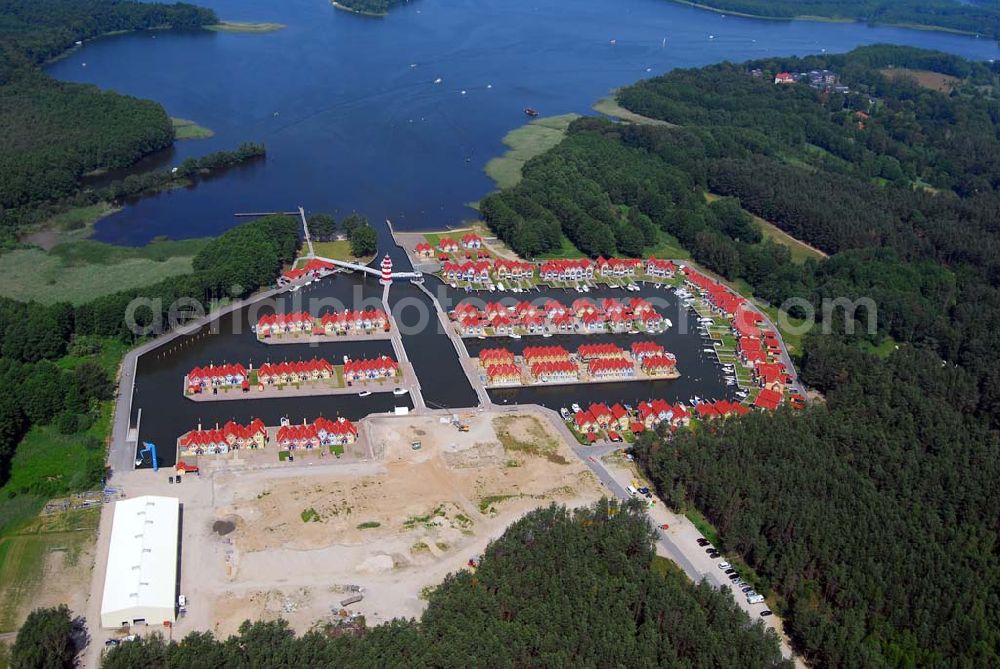 Aerial photograph Rheinsberg - Blick auf das fast fertige Hafendorf Rheinsberg - Projektgesellschaft Hafendorf Rheinsberg GmbH,Lenaustr. 27,D-12305 Berlin,Telefon: +49 33931/34 161,Telefax: +49 33931/34 163,Email: info@hafendorf-rheinsberg.de,Achim Walder: