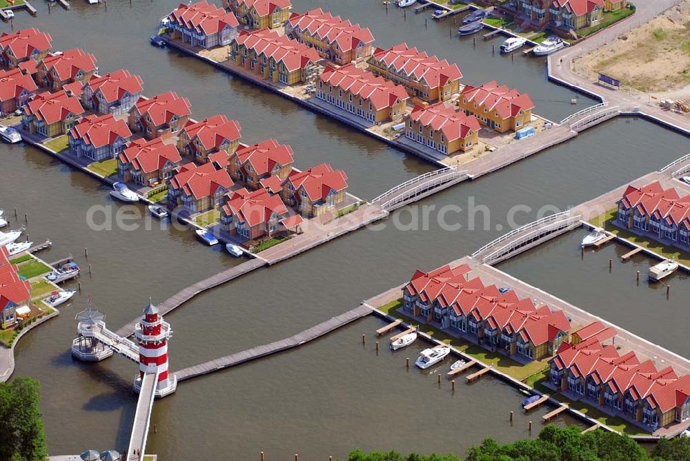 Aerial photograph Rheinsberg - Blick auf das fast fertige Hafendorf Rheinsberg - Projektgesellschaft Hafendorf Rheinsberg GmbH,Lenaustr. 27,D-12305 Berlin,Telefon: +49 33931/34 161,Telefax: +49 33931/34 163,Email: info@hafendorf-rheinsberg.de,Achim Walder: