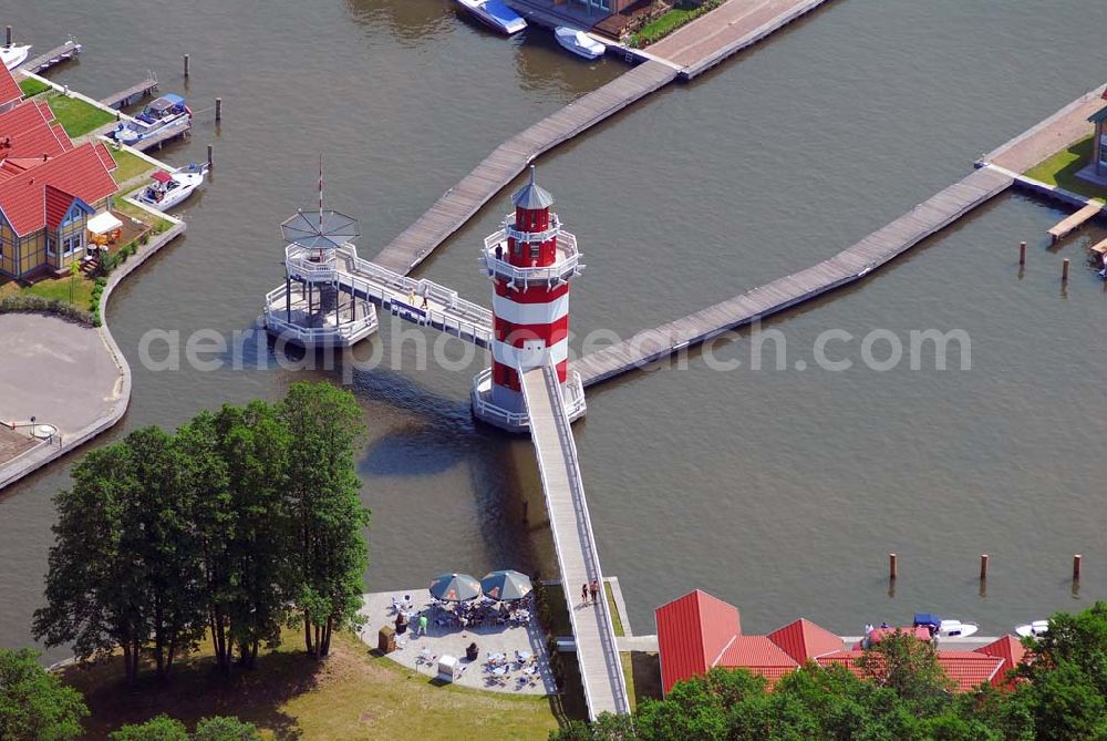 Rheinsberg from the bird's eye view: Blick auf das fast fertige Hafendorf Rheinsberg - Projektgesellschaft Hafendorf Rheinsberg GmbH,Lenaustr. 27,D-12305 Berlin,Telefon: +49 33931/34 161,Telefax: +49 33931/34 163,Email: info@hafendorf-rheinsberg.de,Achim Walder: