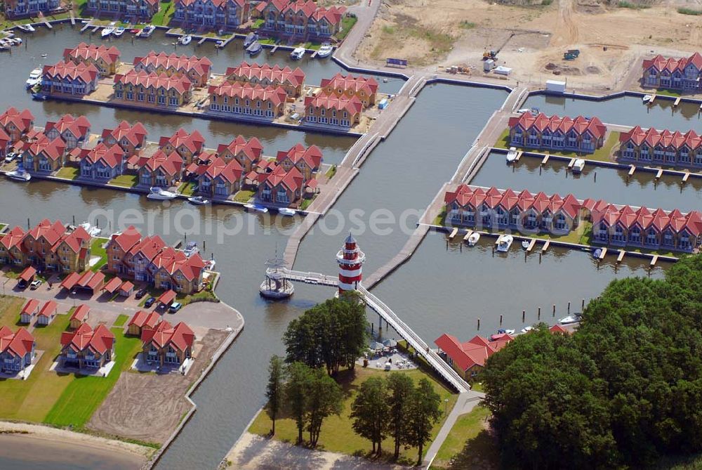 Aerial photograph Rheinsberg - Blick auf das fast fertige Hafendorf Rheinsberg - Projektgesellschaft Hafendorf Rheinsberg GmbH,Lenaustr. 27,D-12305 Berlin,Telefon: +49 33931/34 161,Telefax: +49 33931/34 163,Email: info@hafendorf-rheinsberg.de,Achim Walder: