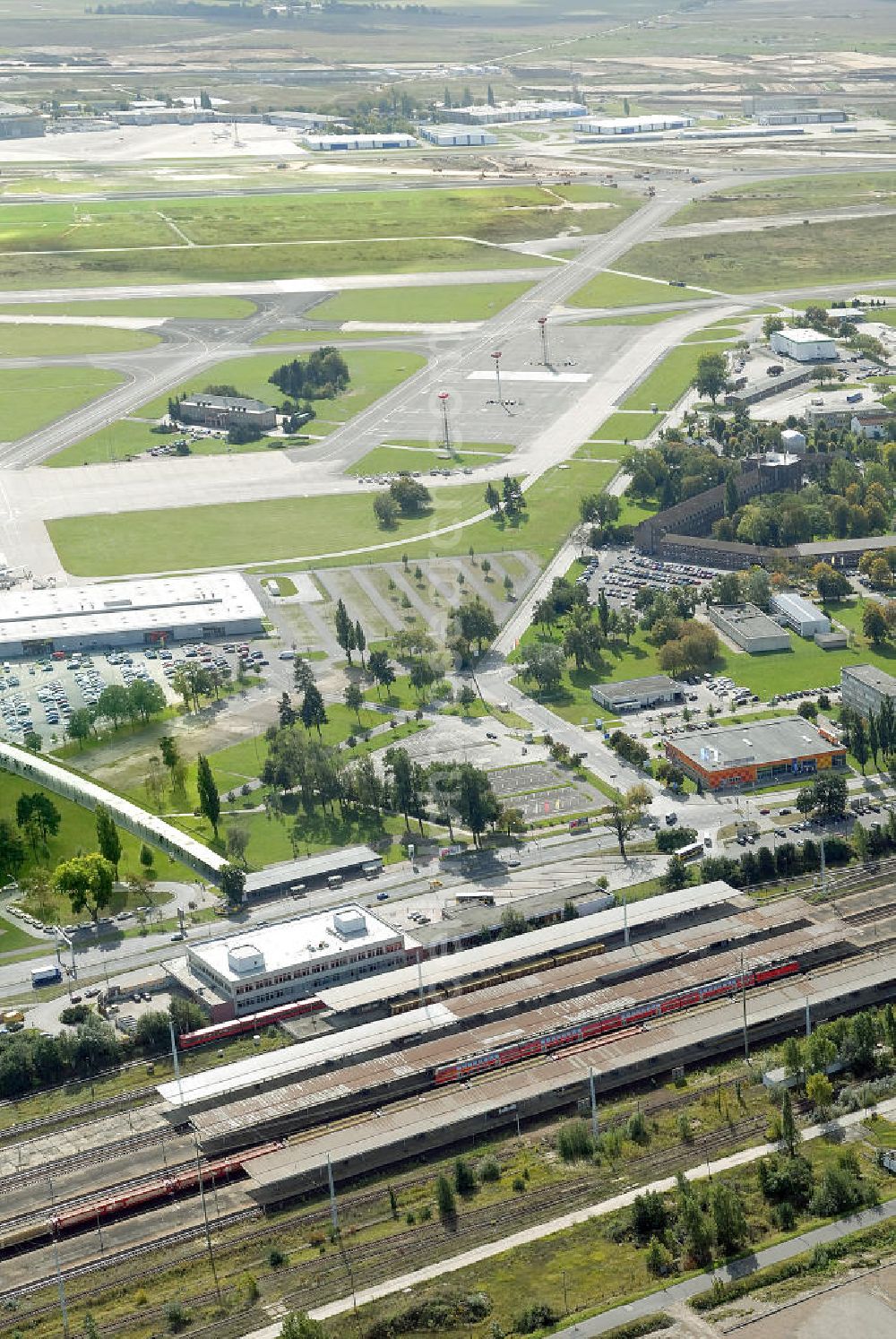 Schönefeld from above - Blick auf den Fern- und S- Bahnhof am Flughafen Schönefeld, BBI. View of the suburban train and train station at Schönefeld airport, BBI.