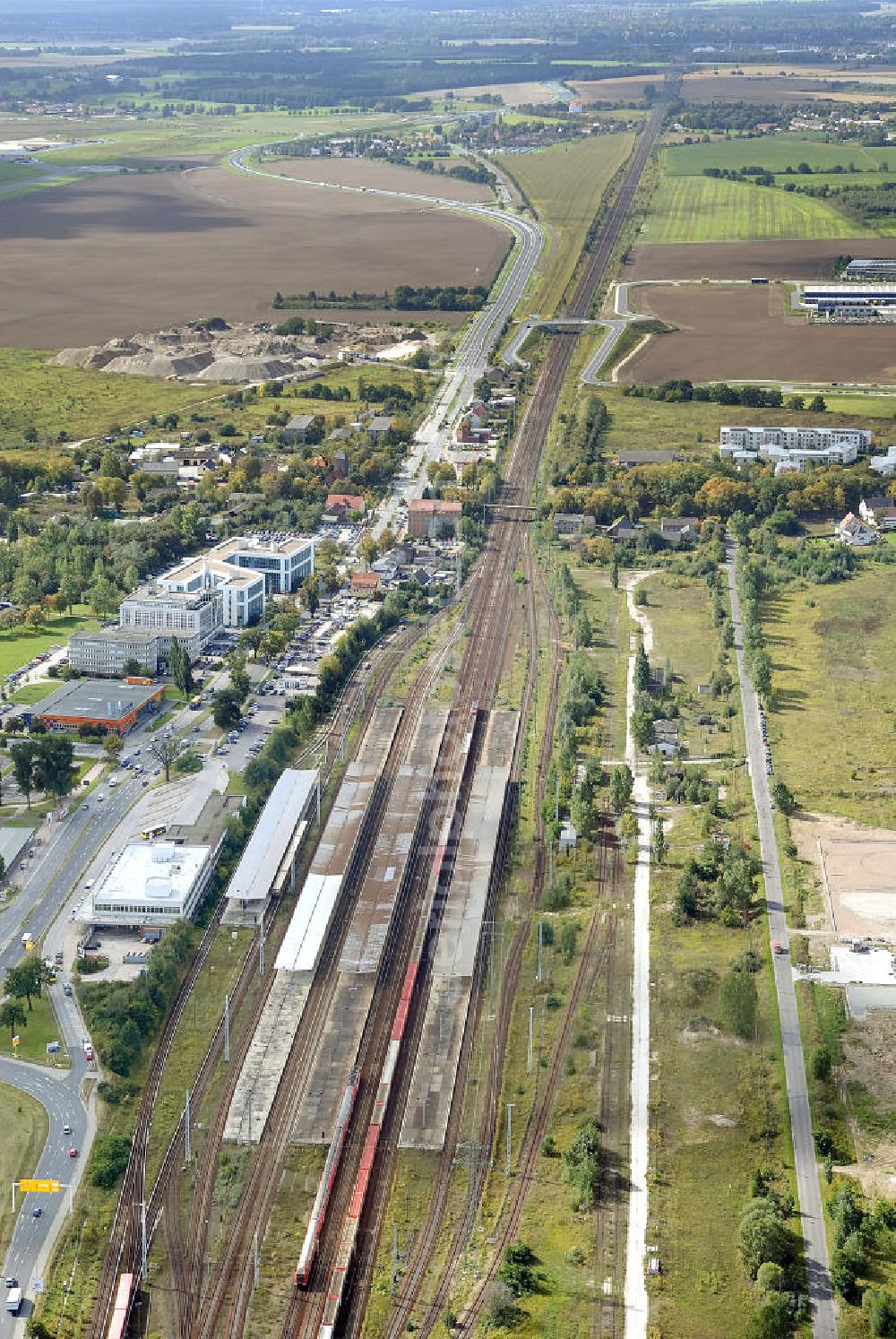 Aerial image Schönefeld - Blick auf den Fern- und S- Bahnhof am Flughafen Schönefeld, BBI. View of the suburban train and train station at Schönefeld airport, BBI.