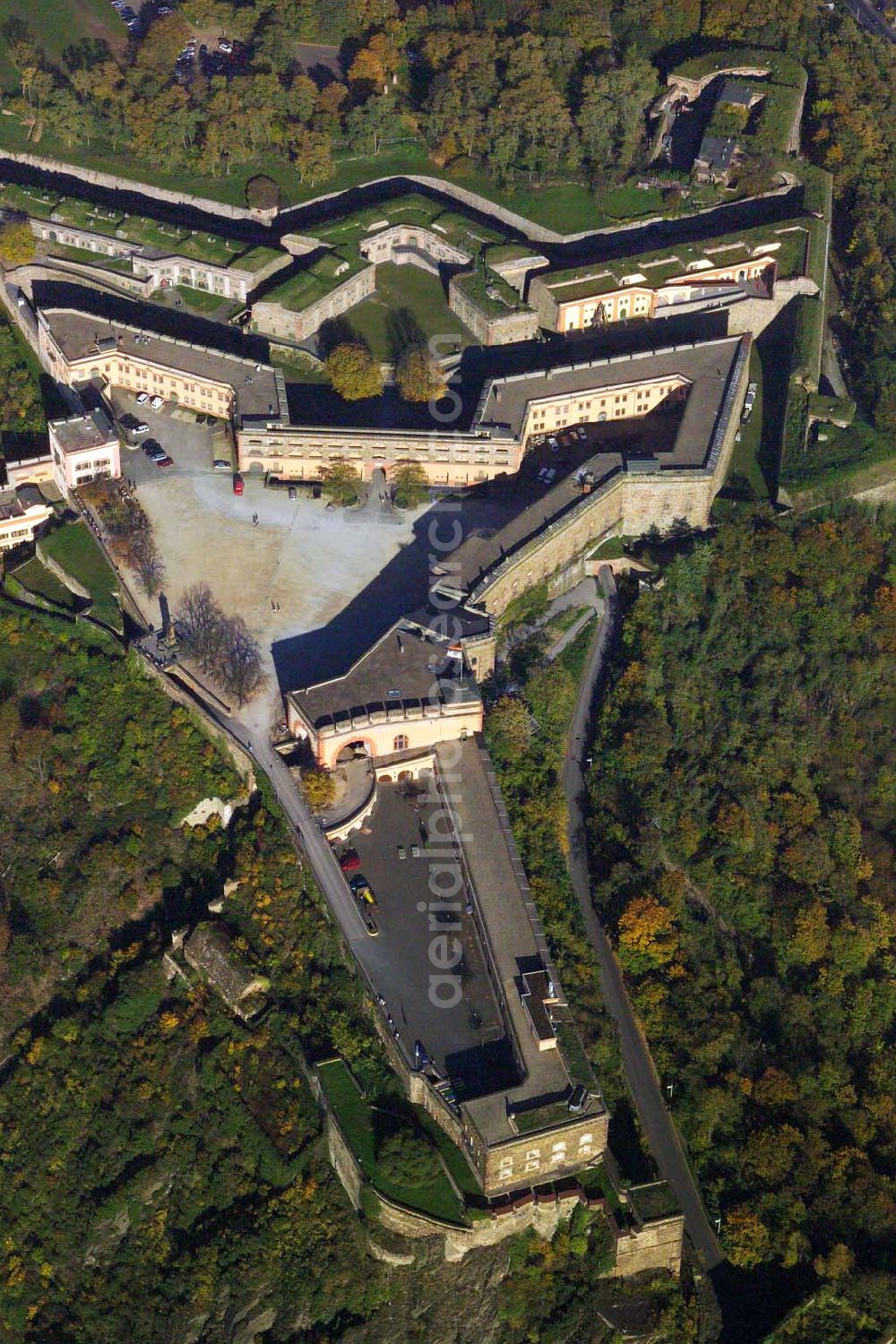 Aerial image Koblenz - 28.10 2005 Koblenz / Rheinland Pfalz, Blick auf die Festung Ehrenbreitstein im gleichnamigen Stadtviertel von Koblenz. Um die Mitte des 10. Jahrhundert erbaute ein Ehrembrecht aus dem Lahngauisch-Konradinischen Herzogsgeschlecht hier eine Burg. Besucher aus aller Welt kommen auf den Ehrenbreitstein, nicht nur wegen der architektonischen Schönheit und der Museen, sondern vor allem wegen der prächtigen Lage über den beiden Flüssen.