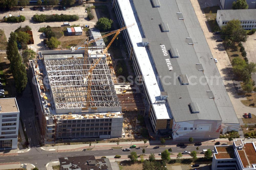 Berlin from above - Blick auf das Firmengelände der Studio Berlin Adlershof (SBA) GmbH mit Baustelle in Berlin Adlershof. Das Unternehmen ist Dienstleister für Drehbuchentwicklung, Bühnenbau, Fernsehproduktionen, digitale Postproduktion, uvm. Kontakt: Studio Berlin Adlershof (SBA) GmbH, Am Studio 20, 12489 Berlin, Tel. +49 (0)30 67 04 55 00, Fax +49 (0)30 67 04 55 05, info@studio-berlin.de