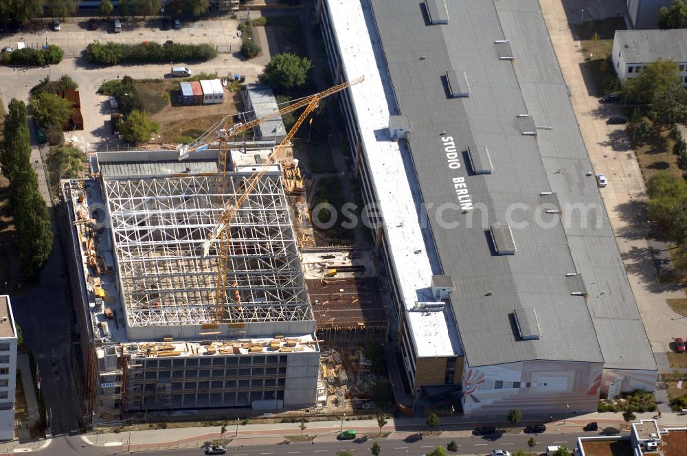 Berlin from above - Blick auf das Firmengelände der Studio Berlin Adlershof (SBA) GmbH mit Baustelle in Berlin Adlershof. Das Unternehmen ist Dienstleister für Drehbuchentwicklung, Bühnenbau, Fernsehproduktionen, digitale Postproduktion, uvm. Kontakt: Studio Berlin Adlershof (SBA) GmbH, Am Studio 20, 12489 Berlin, Tel. +49 (0)30 67 04 55 00, Fax +49 (0)30 67 04 55 05, info@studio-berlin.de