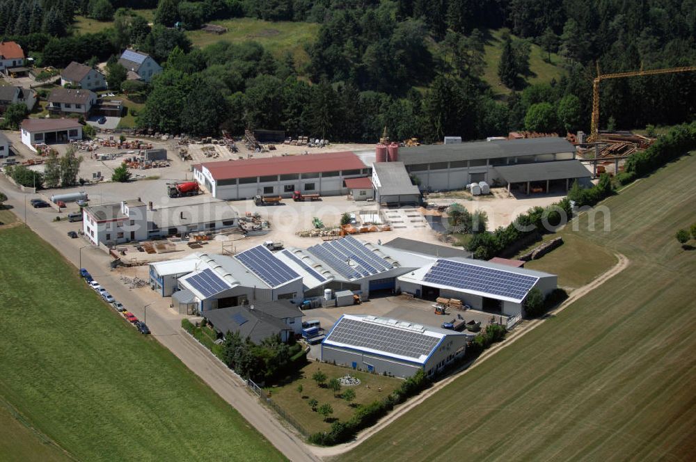 Aerial image Pappenheim - Blick auf ein Firmengelände in Pappenheim OT Geislohe. Die Firma FHG-Bau Geislohe ist seit 1925 in Familienbesitz. Mit 40 Mitarbeitern führt sie Hoch- und Tiefbauarbeiten aus. Kontakt: F.Hüttinger GmbH & Co. Bau KG, Geislohe 38, 91788 Pappenheim, Tel. +49 (0)9149 94 11 0, Fax +49 (0)9149 94 11 50, Email info@fhg-bau.de