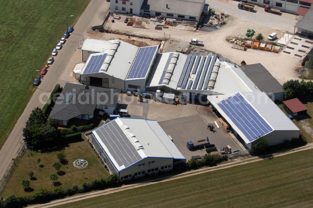 Pappenheim from above - Blick auf ein Firmengelände in Pappenheim OT Geislohe. Die Firma FHG-Bau Geislohe ist seit 1925 in Familienbesitz. Mit 40 Mitarbeitern führt sie Hoch- und Tiefbauarbeiten aus. Kontakt: F.Hüttinger GmbH & Co. Bau KG, Geislohe 38, 91788 Pappenheim, Tel. +49 (0)9149 94 11 0, Fax +49 (0)9149 94 11 50, Email info@fhg-bau.de