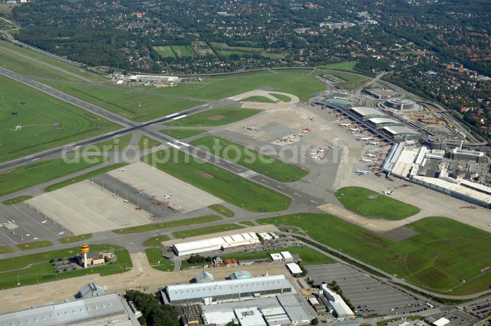 Hamburg from the bird's eye view: Blick auf den Flughafen Hamburg. Der Flughafen ist der internationale Flughafen der Hansestadt Hamburg. Er ist der älteste und fünftgrößte Flughafen Deutschlands. Mittlerweile gehört er zu Europas modernsten Flughäfen. Kontakt: Flughafen Hamburg GmbH, Flughafenstr. 1 - 3, 22335 Hamburg, Tel.: +49(0)405075 0, Fax: +49(0)405075 1234, E-Mail: fhg@ham.airport.de