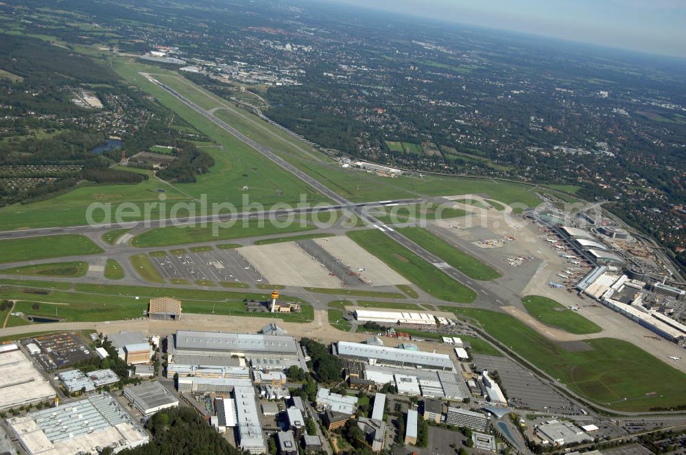 Aerial image Hamburg - Blick auf den Flughafen Hamburg. Der Flughafen ist der internationale Flughafen der Hansestadt Hamburg. Er ist der älteste und fünftgrößte Flughafen Deutschlands. Mittlerweile gehört er zu Europas modernsten Flughäfen. Kontakt: Flughafen Hamburg GmbH, Flughafenstr. 1 - 3, 22335 Hamburg, Tel.: +49(0)405075 0, Fax: +49(0)405075 1234, E-Mail: fhg@ham.airport.de