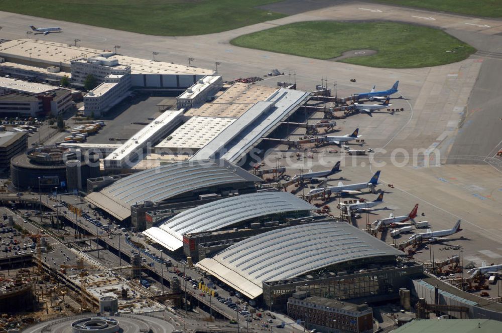 Hamburg from the bird's eye view: Blick auf den Flughafen Hamburg. Der Flughafen ist der internationale Flughafen der Hansestadt Hamburg. Er ist der älteste und fünftgrößte Flughafen Deutschlands. Mittlerweile gehört er zu Europas modernsten Flughäfen. Kontakt: Flughafen Hamburg GmbH, Flughafenstr. 1 - 3, 22335 Hamburg, Tel.: +49(0)405075 0, Fax: +49(0)405075 1234, E-Mail: fhg@ham.airport.de