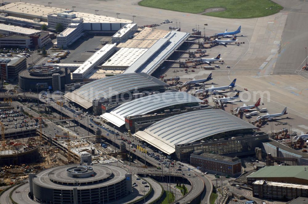 Aerial image Hamburg - Blick auf den Flughafen Hamburg. Der Flughafen ist der internationale Flughafen der Hansestadt Hamburg. Er ist der älteste und fünftgrößte Flughafen Deutschlands. Mittlerweile gehört er zu Europas modernsten Flughäfen. Kontakt: Flughafen Hamburg GmbH, Flughafenstr. 1 - 3, 22335 Hamburg, Tel.: +49(0)405075 0, Fax: +49(0)405075 1234, E-Mail: fhg@ham.airport.de