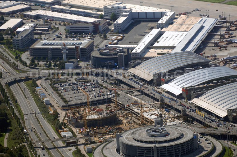 Aerial photograph Hamburg - Blick auf den Flughafen Hamburg. Der Flughafen ist der internationale Flughafen der Hansestadt Hamburg. Er ist der älteste und fünftgrößte Flughafen Deutschlands. Mittlerweile gehört er zu Europas modernsten Flughäfen. Kontakt: Flughafen Hamburg GmbH, Flughafenstr. 1 - 3, 22335 Hamburg, Tel.: +49(0)405075 0, Fax: +49(0)405075 1234, E-Mail: fhg@ham.airport.de