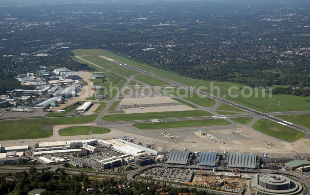 Hamburg from above - Blick auf den Flughafen Hamburg. Der Flughafen ist der internationale Flughafen der Hansestadt Hamburg. Er ist der älteste und fünftgrößte Flughafen Deutschlands. Mittlerweile gehört er zu Europas modernsten Flughäfen. Kontakt: Flughafen Hamburg GmbH, Flughafenstr. 1 - 3, 22335 Hamburg, Tel.: +49(0)405075 0, Fax: +49(0)405075 1234, E-Mail: fhg@ham.airport.de