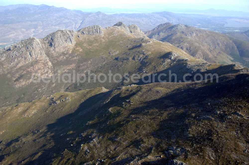 FRANSCHHOEK from above - View of the surroundings of Wemmershoek Mountain near Franschhoek, South Africa. In the foothills of the mountains are the Cape winelands