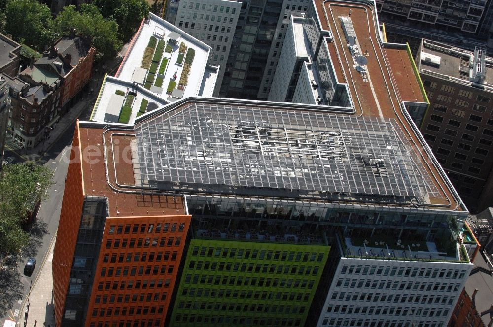 London from the bird's eye view: View of the complex Central Saint Giles in London. The building is a multi-purpose building, designed by the Italian architect Renzo Piano and completed in 2010.The construction is mainly known for its colorful facades in orange, green and blue, and for his tenants, such as NBC Universal and Google