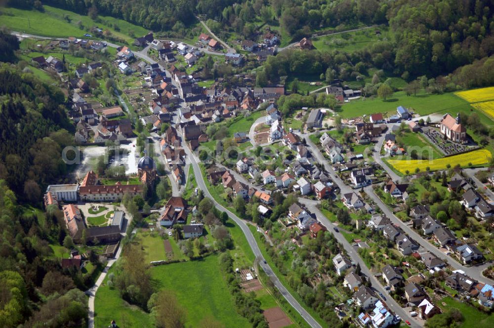 Aerial image Holzkirchen - Blick auf die Gemeinde Holzkirchen in Unterfranken. Das vor 775 gegründete Kloster Holzkirchen und der Ort waren Teil des Gebietes des Hochstiftes Würzburg und fielen im Reichsdeputationshauptschluss an die Grafen Löwenstein-Wertheim. Im Zuge der Verwaltungsreformen in Bayern entstand mit dem Gemeindeedikt von 1818 die heutige Gemeinde. Verwaltungsgemeinschaft: Im Kies 8 , 97264 Helmstadt, Tel. +49 (0)9369 9079 0, +49 (0)9369 9079 90