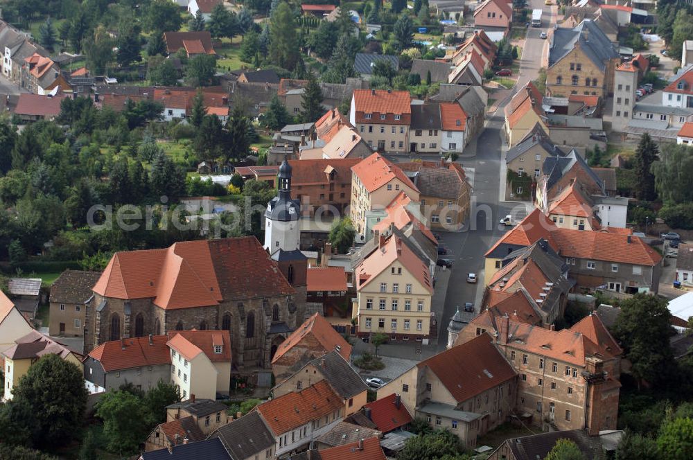 Aerial image Mansfeld - Blick auf die Lutherstadt Mansfeld. Sie trägt den Namenszusatz Lutherstadt, der darauf beruht, dass Martin Luther einen Großteil seiner Kindheit im Ort verbrachte. Sie liegt im östlichen Harzvorland und umfasst das Tal der Wipper. 973 wurde Mansfeld erstmals urkundlich erwähnt. 1400 erhielt es Stadtrechte. Besondere Sehenswürdigkeiten sind das Schloss und die St.-Georg-Kirche.