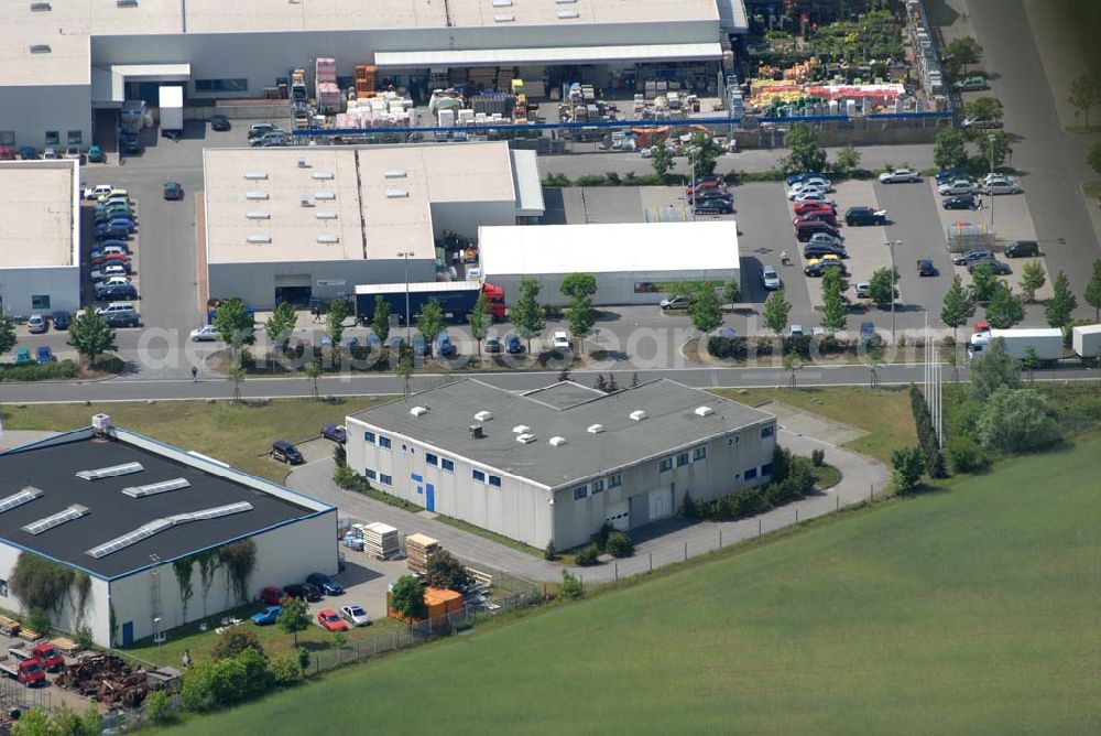 Aerial image Rangsdorf - H.O.M.B.A.S; Vermietung von Veranstaltungs-, Schulungs und Seminarräume für Jugendweihen Familienfeiern etc.; Räumlichkeiten für jeden Anlass; “Proberaum” für Band, Chöre etc. mit Bühne; Mehrzweckraum mit und ohne Beschallung und Catering; Physiofit Physioterapie Mo.-Do. 7.00 - 20.00 Uhr-Fr.7.00 - 12.30 Uhr; Hotline : 0171 7 14 79 90; Tel.++ 49 (0) 3 37 08 2 18 00; Fräntzel Kunststoffe GmbH; Tel. 033708 - 4 23 0; Fax 033708 - 4 23 33; real,- SB Warenhaus; Mo.- Fr.: 8.00-20.00, Sa.: 8.00-22.00; im Gewerbegebiet Theresenhof; DE - 15834 Berlin Rangsdorf; Telefon: 03 37 08 / 23 00; Telefax: 03 37 08 / 23 09 9;