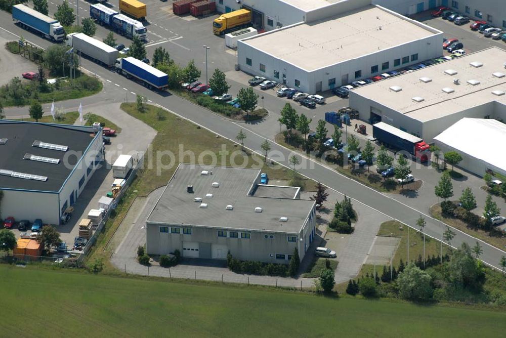 Rangsdorf from the bird's eye view: H.O.M.B.A.S; Vermietung von Veranstaltungs-, Schulungs und Seminarräume für Jugendweihen Familienfeiern etc.; Räumlichkeiten für jeden Anlass; “Proberaum” für Band, Chöre etc. mit Bühne; Mehrzweckraum mit und ohne Beschallung und Catering; Physiofit Physioterapie Mo.-Do. 7.00 - 20.00 Uhr-Fr.7.00 - 12.30 Uhr; Hotline : 0171 7 14 79 90; Tel.++ 49 (0) 3 37 08 2 18 00; Fräntzel Kunststoffe GmbH; Tel. 033708 - 4 23 0; Fax 033708 - 4 23 33; real,- SB Warenhaus; Mo.- Fr.: 8.00-20.00, Sa.: 8.00-22.00; im Gewerbegebiet Theresenhof; DE - 15834 Berlin Rangsdorf; Telefon: 03 37 08 / 23 00; Telefax: 03 37 08 / 23 09 9;