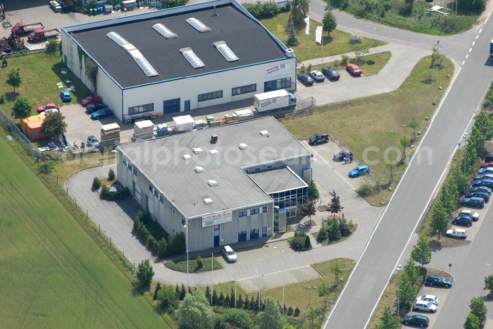 Aerial image Rangsdorf - H.O.M.B.A.S; Vermietung von Veranstaltungs-, Schulungs und Seminarräume für Jugendweihen Familienfeiern etc.; Räumlichkeiten für jeden Anlass; “Proberaum” für Band, Chöre etc. mit Bühne; Mehrzweckraum mit und ohne Beschallung und Catering; Physiofit Physioterapie Mo.-Do. 7.00 - 20.00 Uhr-Fr.7.00 - 12.30 Uhr; Hotline : 0171 7 14 79 90; Tel.++ 49 (0) 3 37 08 2 18 00; Fräntzel Kunststoffe GmbH; Tel. 033708 - 4 23 0; Fax 033708 - 4 23 33; real,- SB Warenhaus; Mo.- Fr.: 8.00-20.00, Sa.: 8.00-22.00; im Gewerbegebiet Theresenhof; DE - 15834 Berlin Rangsdorf; Telefon: 03 37 08 / 23 00; Telefax: 03 37 08 / 23 09 9;