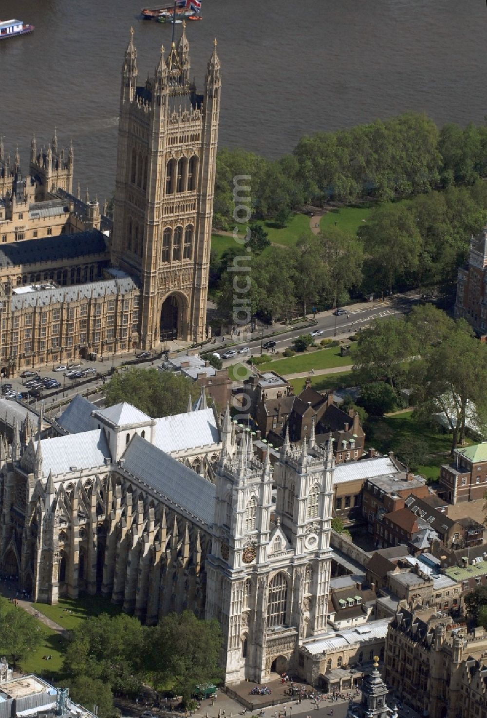 London from the bird's eye view: View on the church and tourist attraction Westminster Abbeyl in London. The building was traditionally constructed for the coronation and funerals of british monarchs and is placed next to the Palace of Westminster