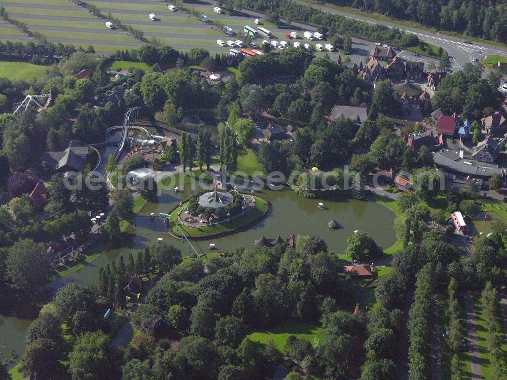 Soltau (Niedersachsen) from above - Norddeutschlands größter Erlebnispark mit über 50 Fahrattraktionen,Tieren & Shows (z.B. Delfinshow und Seelöwenshow), Events, Konzerte und Sonderveranstaltungen, Event-Location für Firmenveranstaltungen, Feriendorf „Heide- Park Holiday Camp“ Gesamtfläche:850.000 Quadratmeter Besucher in 2004: 1.400.000; Mitarbeiter: 150-900 je nach Saison. Werkstätten: Bauschlosserei, Kfz.-Werkstatt, Elektrowerkstatt, Tischlerei, Zimmerei, Malerei, Klempnerei, Gärtnerei, Atelier Heide-Park Soltau GmbH, der Tussauds Group zugehörig; Heidenhof, 29614 Soltau; Telefon: 01805 – 91 91 01; Fax: 05191/91 111;