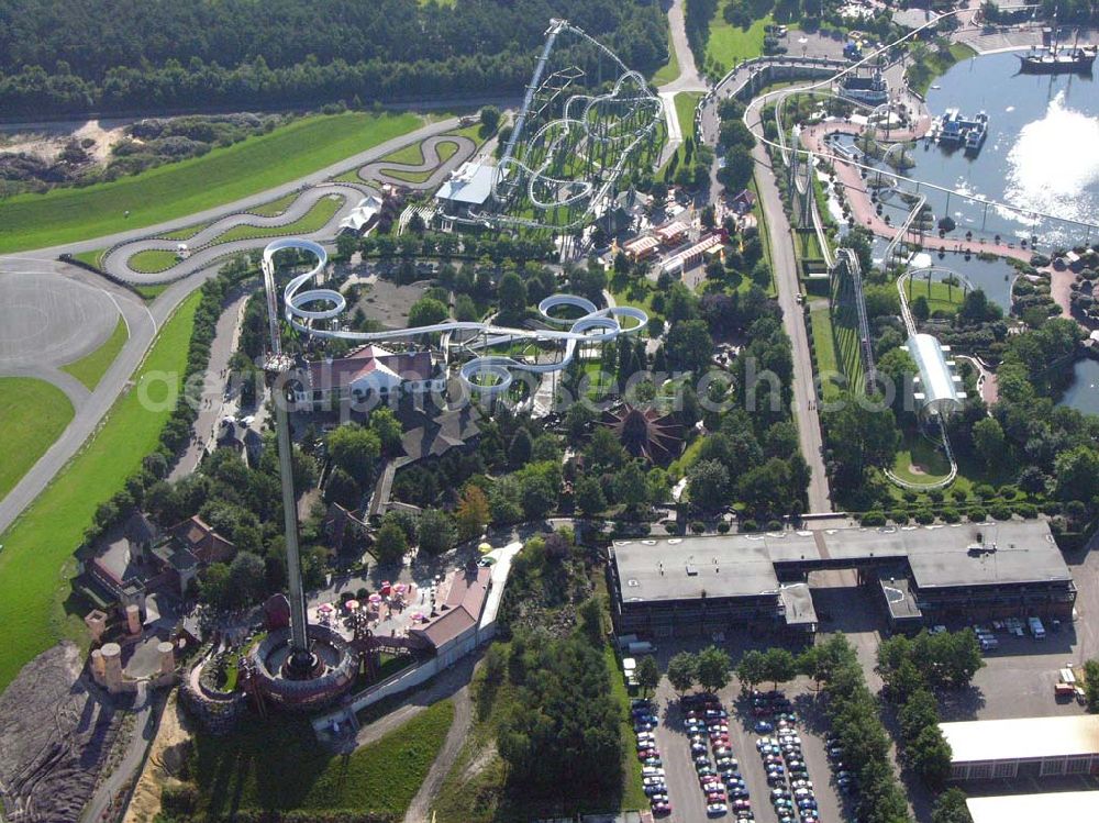 Soltau (Niedersachsen) from the bird's eye view: Norddeutschlands größter Erlebnispark mit über 50 Fahrattraktionen,Tieren & Shows (z.B. Delfinshow und Seelöwenshow), Events, Konzerte und Sonderveranstaltungen, Event-Location für Firmenveranstaltungen, Feriendorf „Heide- Park Holiday Camp“ Gesamtfläche:850.000 Quadratmeter Besucher in 2004: 1.400.000; Mitarbeiter: 150-900 je nach Saison. Werkstätten: Bauschlosserei, Kfz.-Werkstatt, Elektrowerkstatt, Tischlerei, Zimmerei, Malerei, Klempnerei, Gärtnerei, Atelier Heide-Park Soltau GmbH, der Tussauds Group zugehörig; Heidenhof, 29614 Soltau; Telefon: 01805 – 91 91 01; Fax: 05191/91 111;