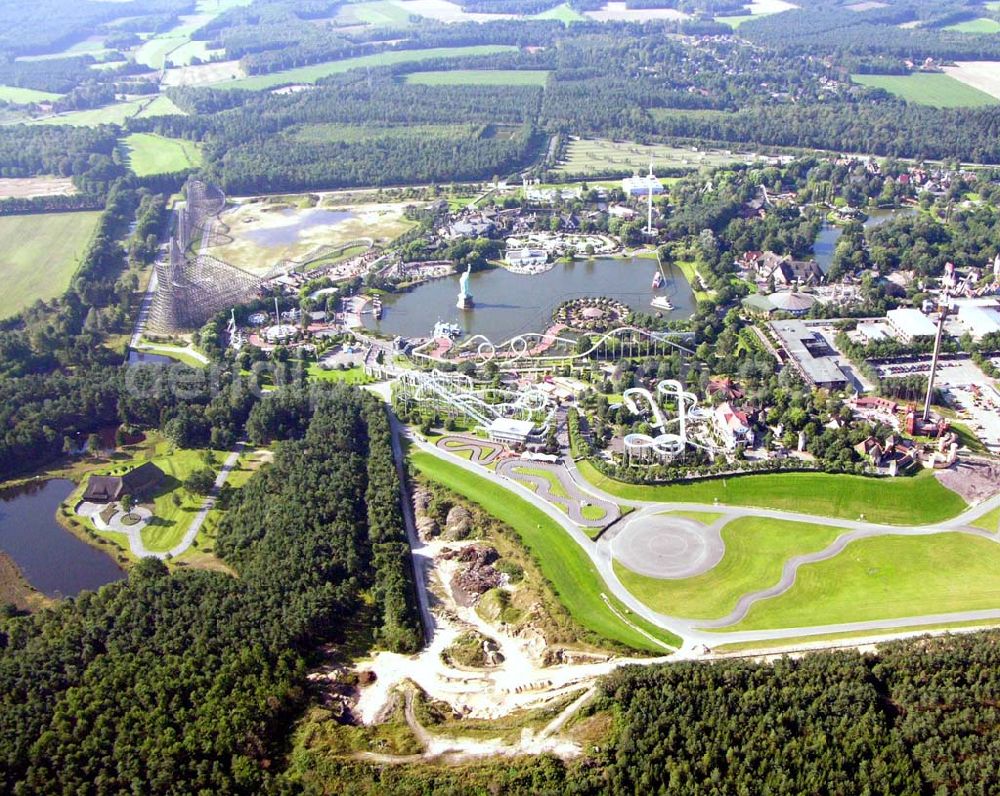 Soltau (Niedersachsen) from the bird's eye view: Norddeutschlands größter Erlebnispark mit über 50 Fahrattraktionen,Tieren & Shows (z.B. Delfinshow und Seelöwenshow), Events, Konzerte und Sonderveranstaltungen, Event-Location für Firmenveranstaltungen, Feriendorf „Heide- Park Holiday Camp“ Gesamtfläche:850.000 Quadratmeter Besucher in 2004: 1.400.000; Mitarbeiter: 150-900 je nach Saison. Werkstätten: Bauschlosserei, Kfz.-Werkstatt, Elektrowerkstatt, Tischlerei, Zimmerei, Malerei, Klempnerei, Gärtnerei, Atelier Heide-Park Soltau GmbH, der Tussauds Group zugehörig; Heidenhof, 29614 Soltau; Telefon: 01805 – 91 91 01; Fax: 05191/91 111;